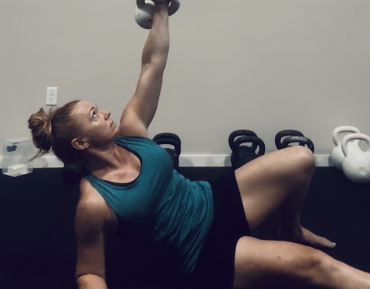 Turkish get-up with a kettlebell at Liberty Bells